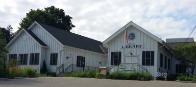 Picture of the white Town Hall Library Building from the Front